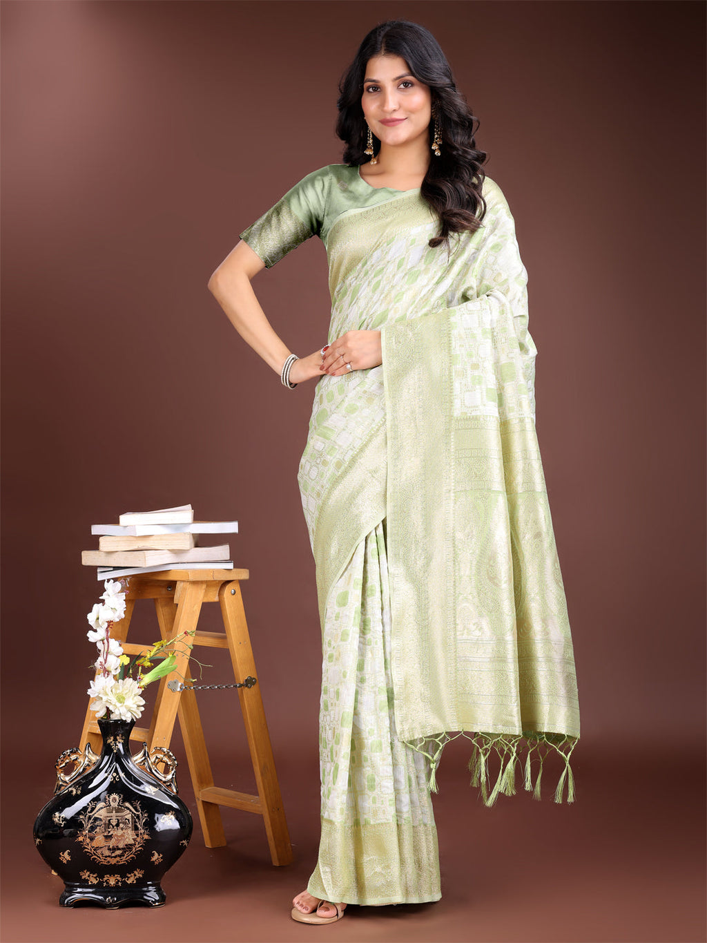 A graceful light green linen cotton saree with delicate woven patterns and soft shimmer.