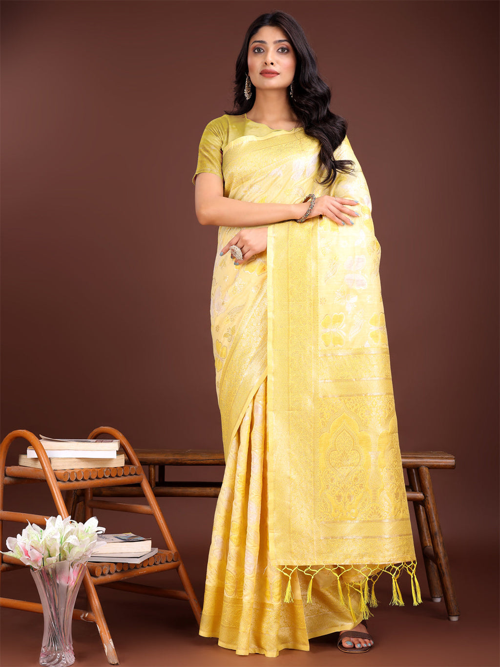 Yellow cotton saree with elegant golden zari work motifs