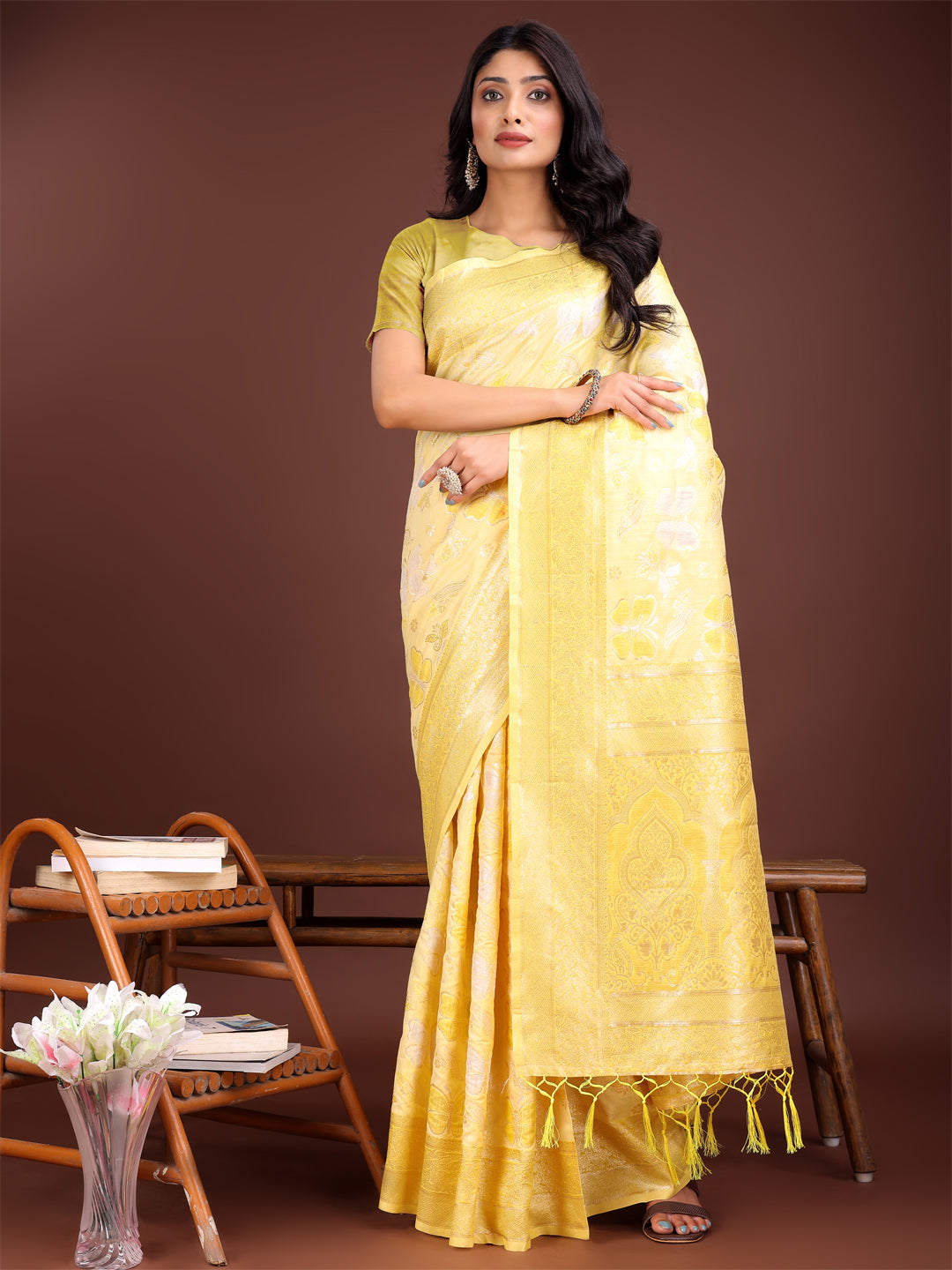 Yellow cotton saree with elegant golden zari work motifs