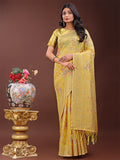 Yellow linen cotton saree with pastel floral weave and gold pallu