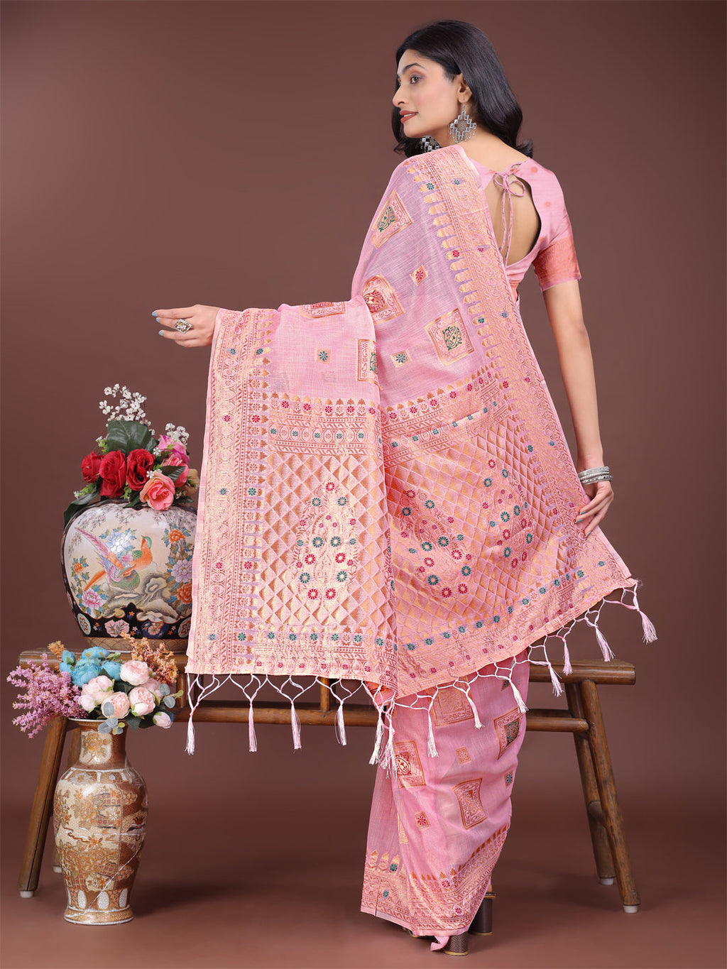 Elegant Light Pink Linen Saree with Intricate Woven Motifs