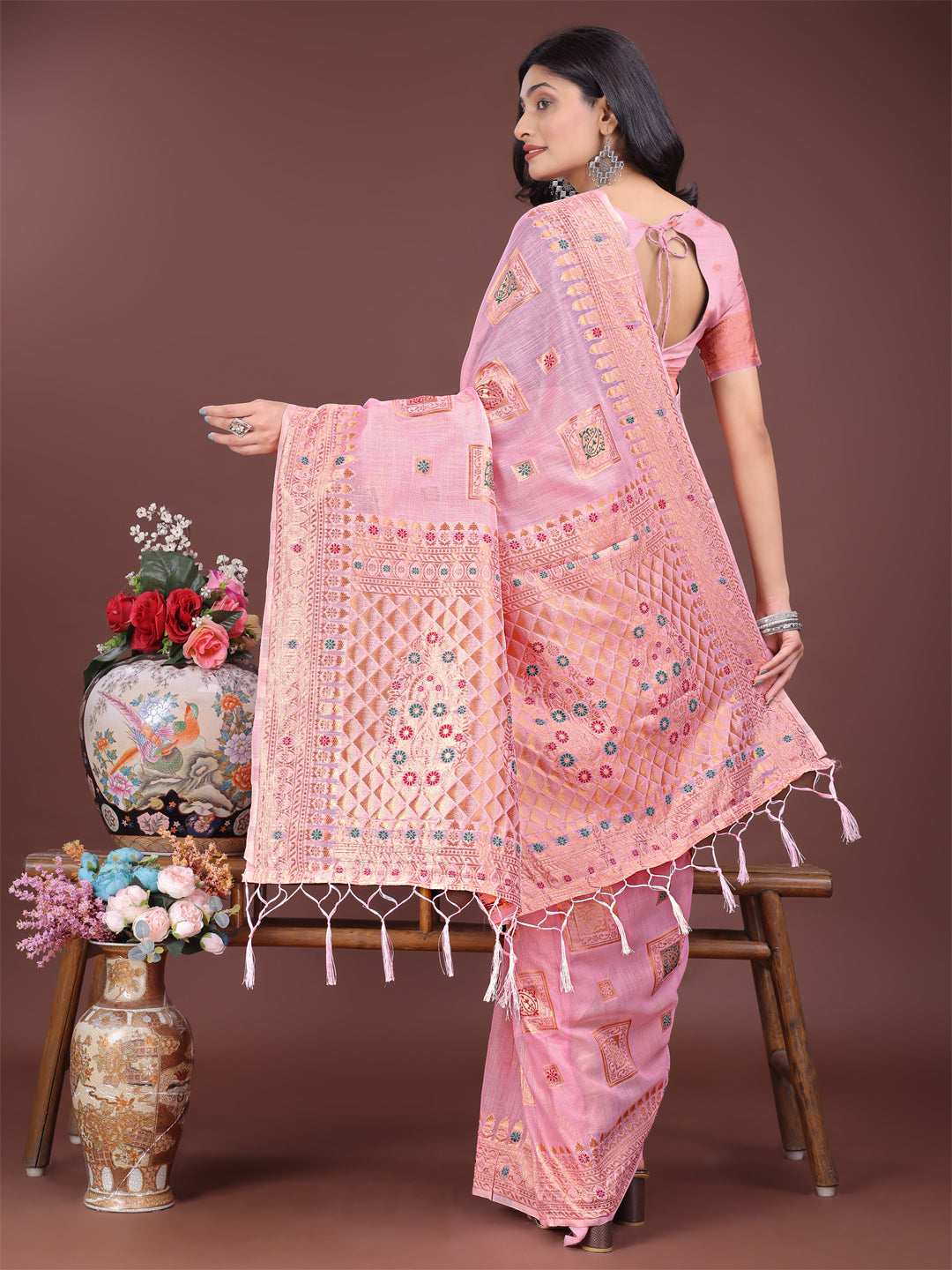 Elegant Light Pink Linen Saree with Intricate Woven Motifs