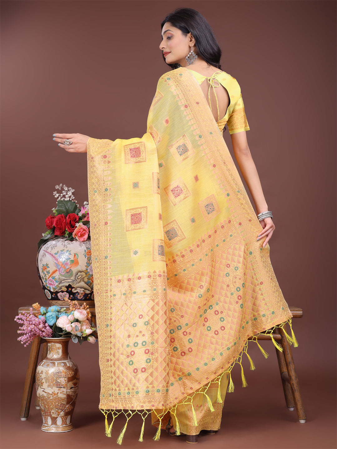 Yellow Linen Saree with Intricate Woven Patterns