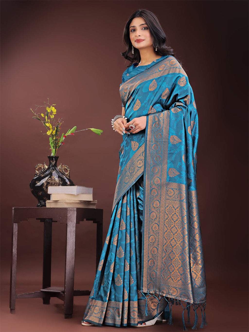 Majestic Teal Banarasi Silk Saree with Golden Zari Motifs