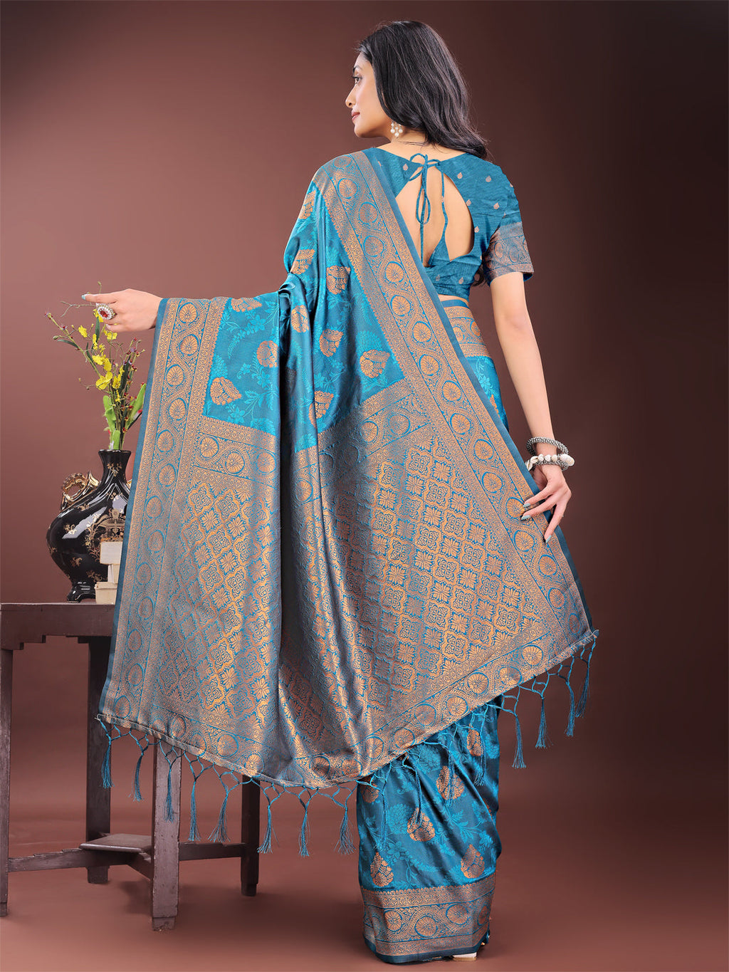 Majestic Teal Banarasi Silk Saree with Golden Zari Motifs