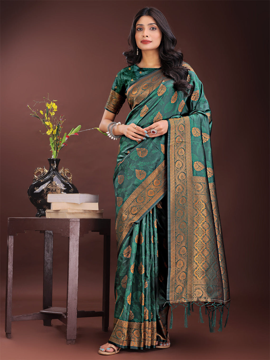 Majestic dark green Banarasi silk saree with intricate golden zari border and motifs