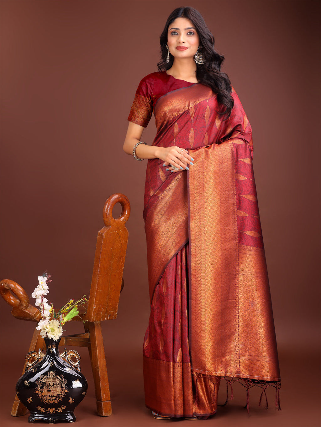 Maroon linen cotton saree with golden zari leaf weaving and rich pallu