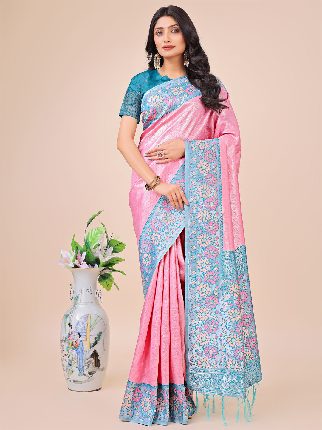 Pink and sky blue lichi silk saree with floral woven motifs and tassels