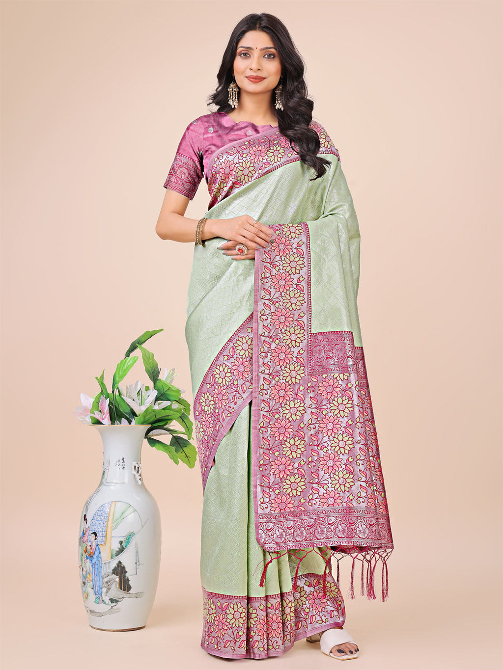 Olive green Lichi silk saree with pink floral woven motifs and rich pallu with tassels