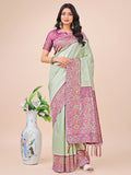 Olive green Lichi silk saree with pink floral woven motifs and rich pallu with tassels