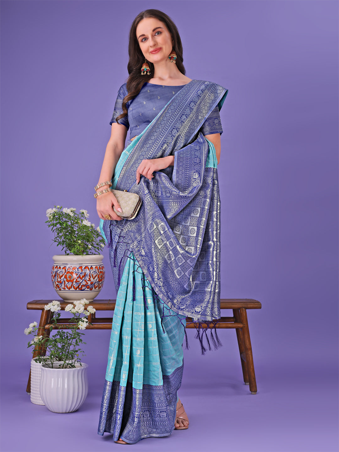Vibrant Sea Green and Blue Lichi Silk Saree with Woven Border