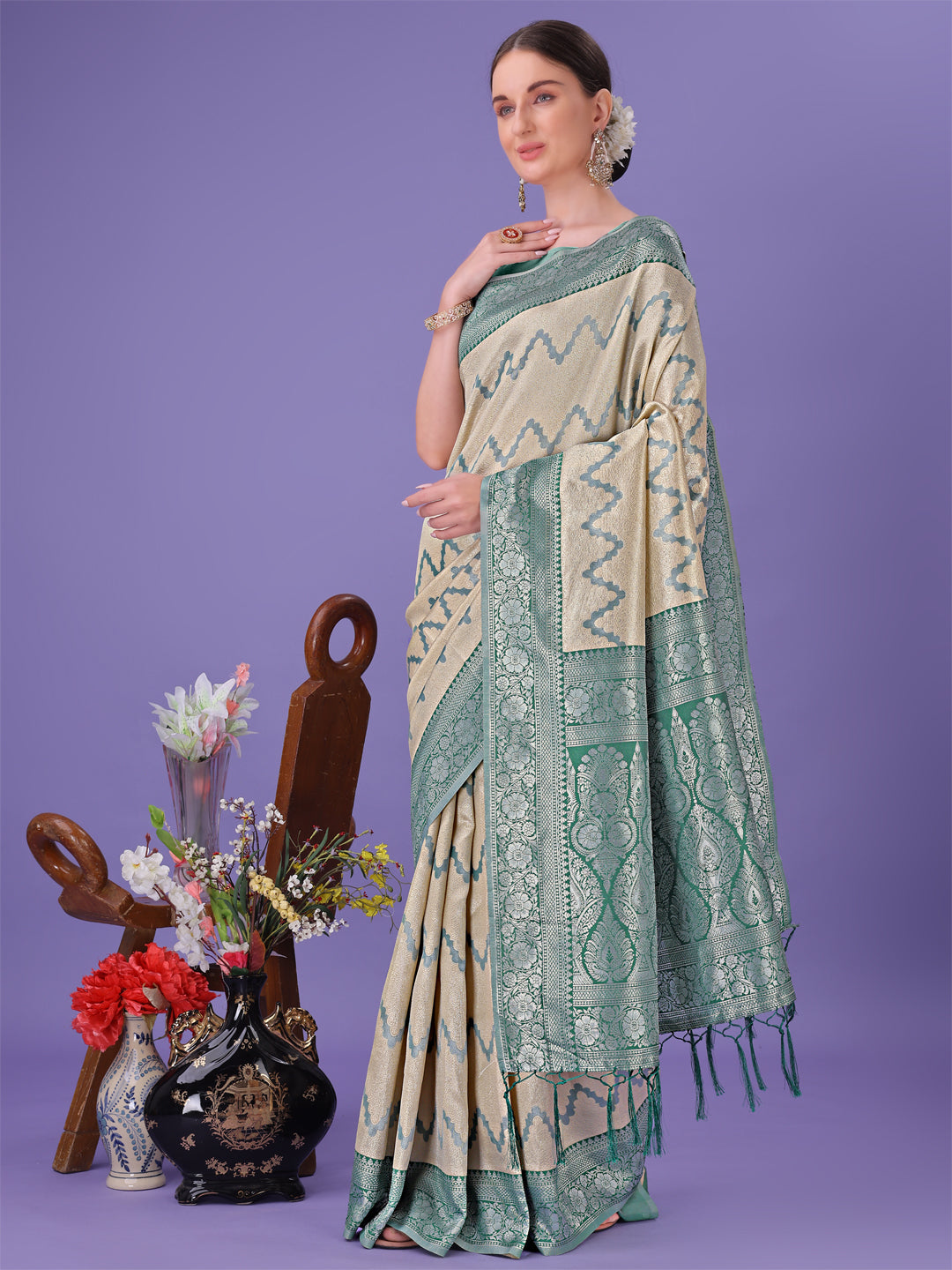 Cream and Green Lichi Silk Saree with Zigzag Woven Border