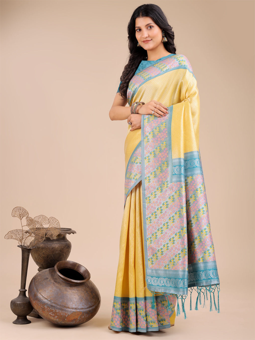 Radiant Yellow Silk Saree with Pink and Blue Floral Patterns