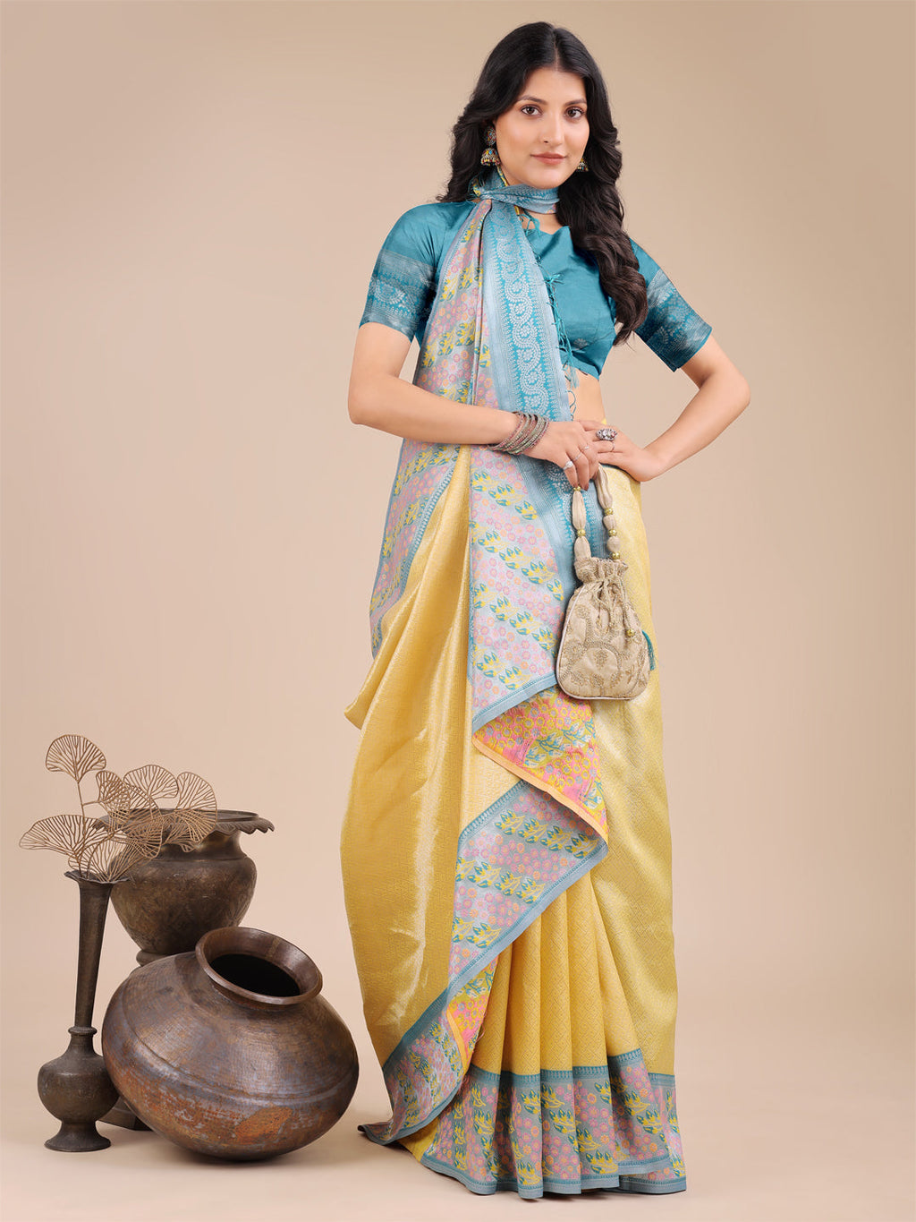 Radiant Yellow Silk Saree with Pink and Blue Floral Patterns