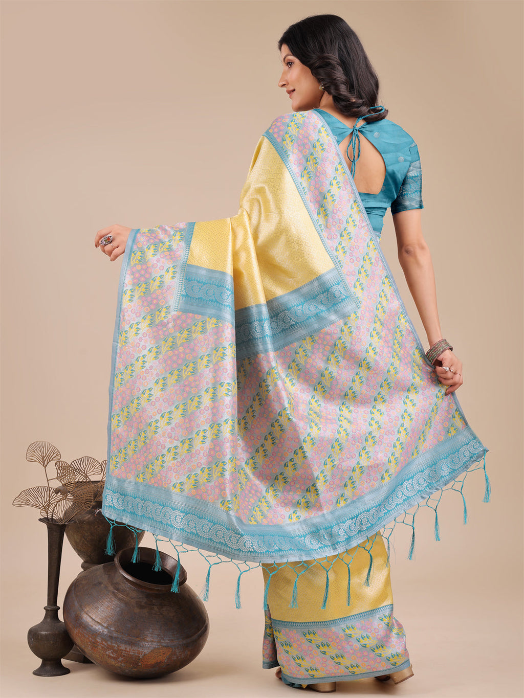 Radiant Yellow Silk Saree with Pink and Blue Floral Patterns