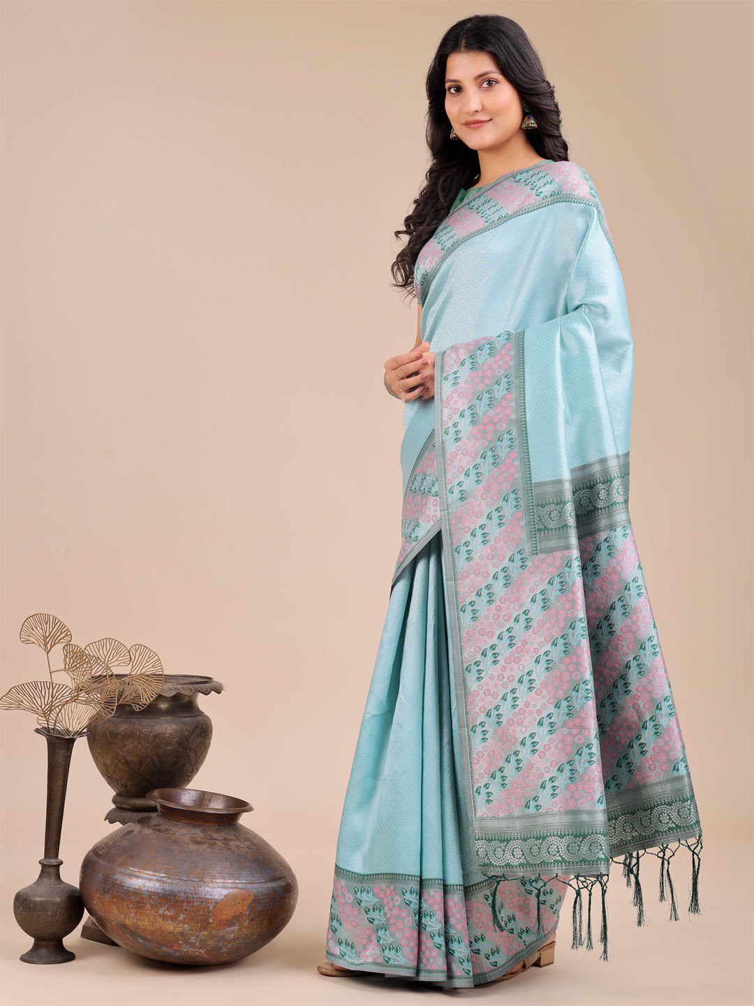 Radiant Teal Silk Saree with Pink and Blue Floral Motifs