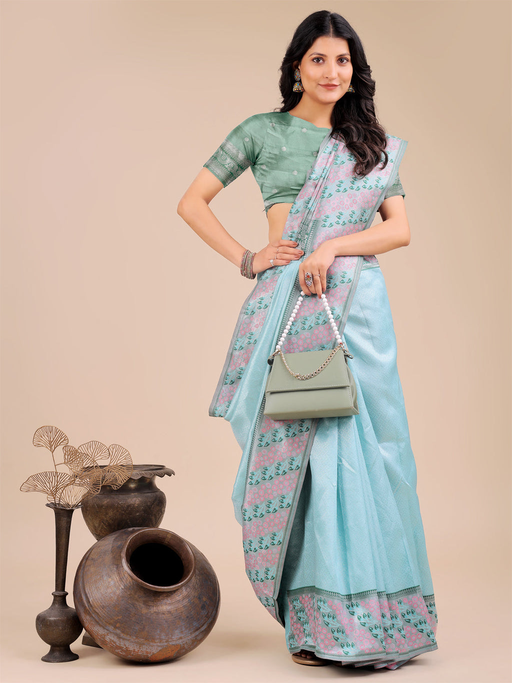 Radiant Teal Silk Saree with Pink and Blue Floral Motifs