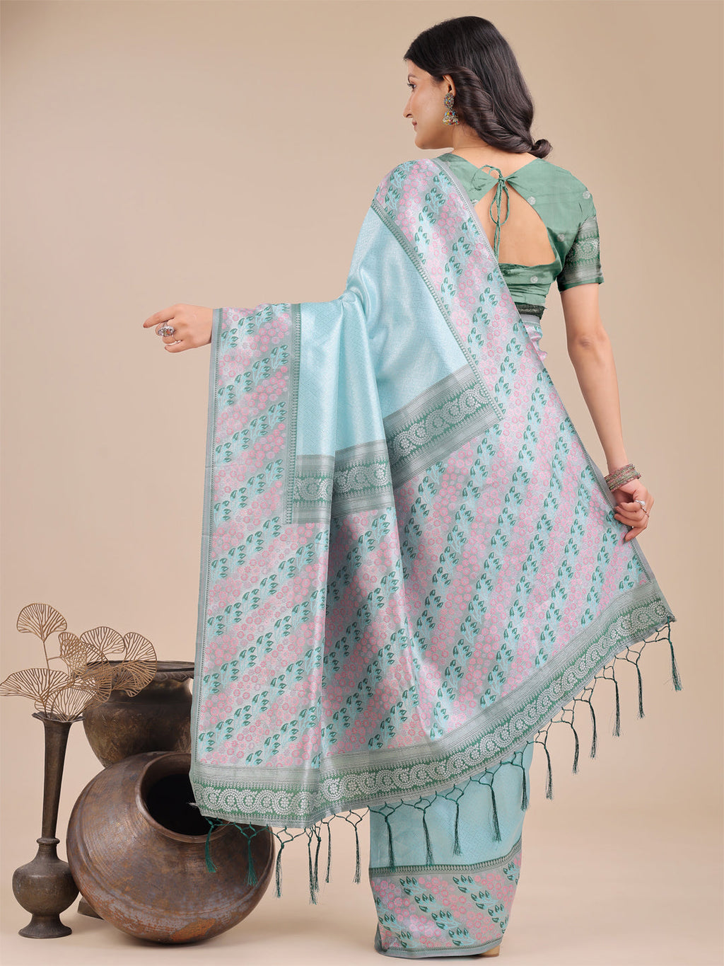 Radiant Teal Silk Saree with Pink and Blue Floral Motifs