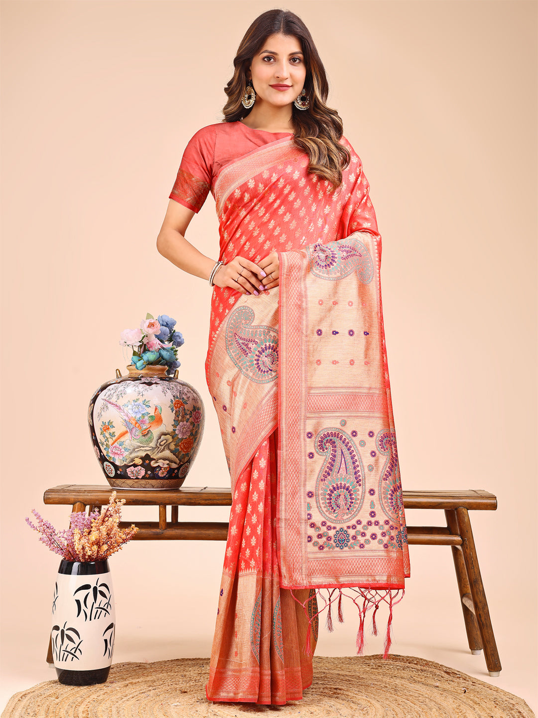 Peach and Beige linen cotton saree featuring royal paisley patterns and golden zari