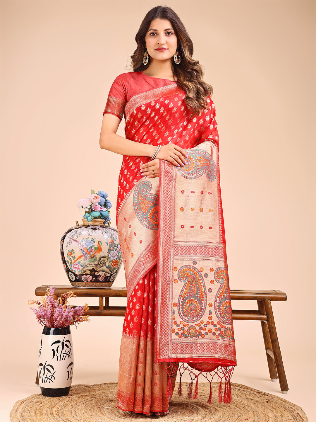 Red and Beige linen cotton saree with royal paisley motifs and golden zari details