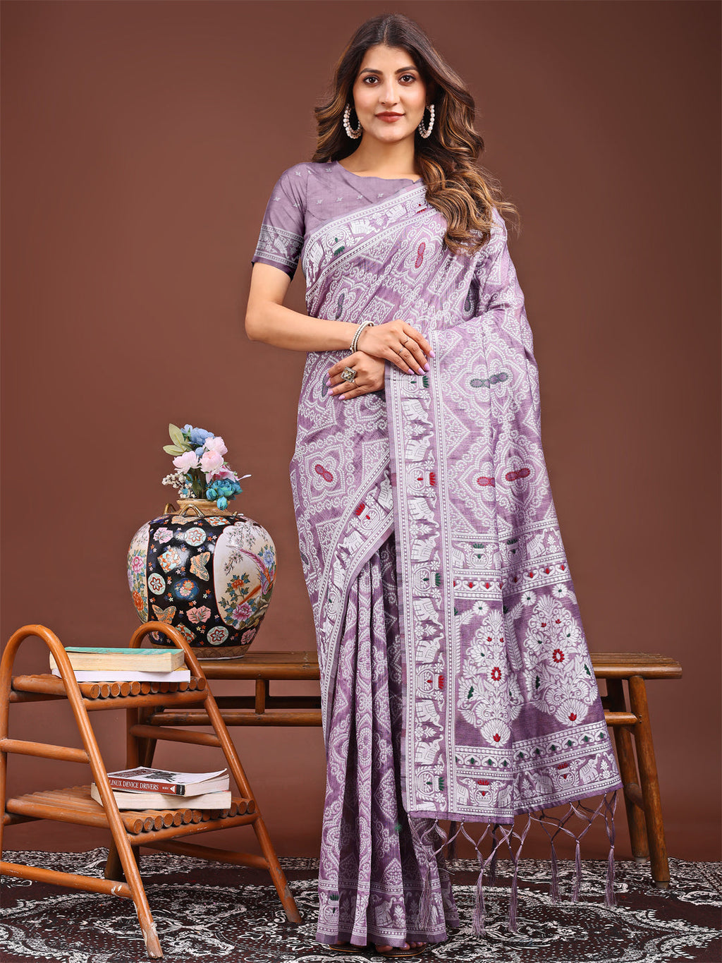 Purple printed saree with traditional ethnic motifs