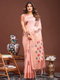 Peach colored jacquard saree with decorative tassel pallu ends