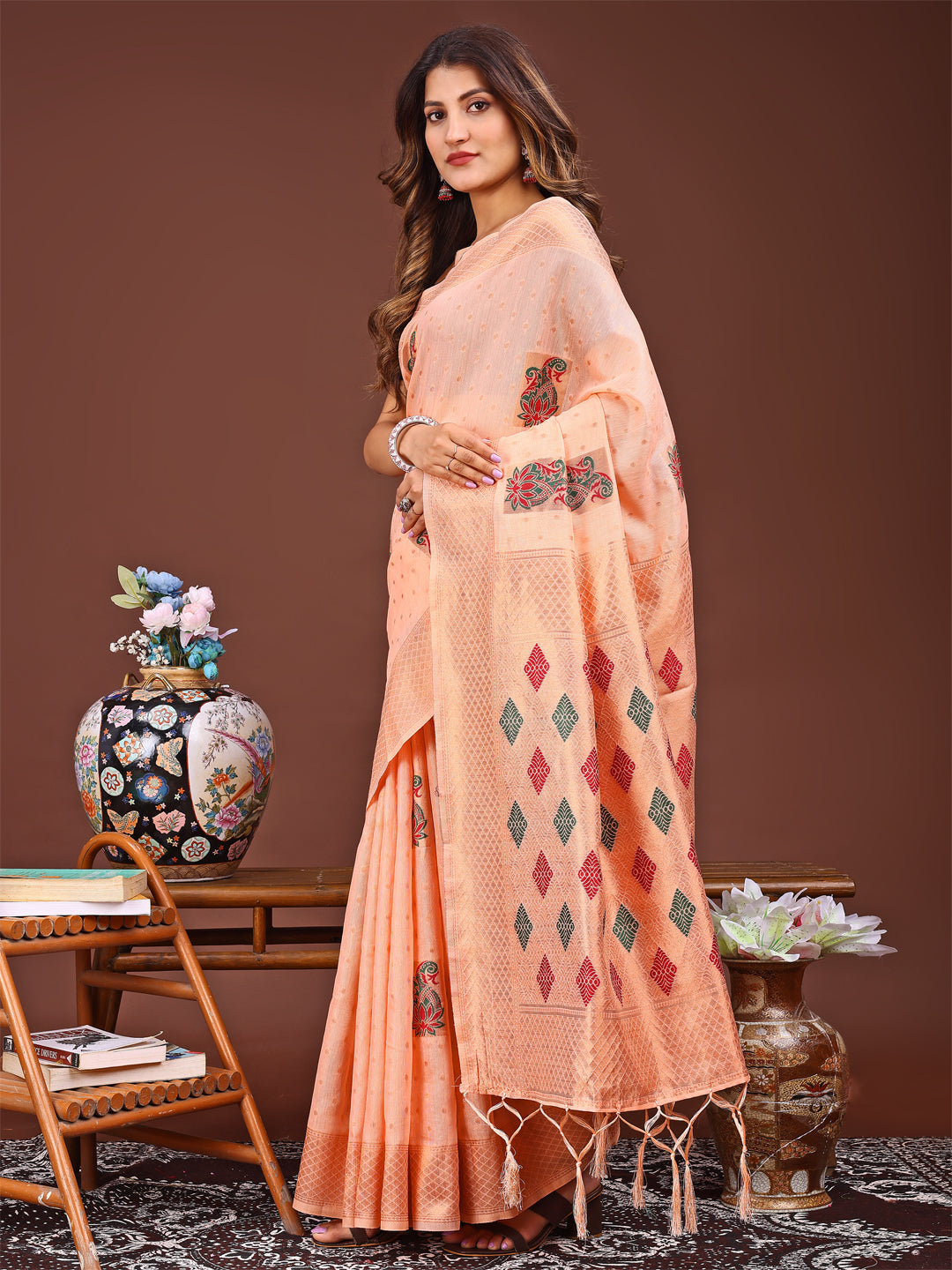 Orange Jacquard Saree with Decorative Tassels and Woven Texture
