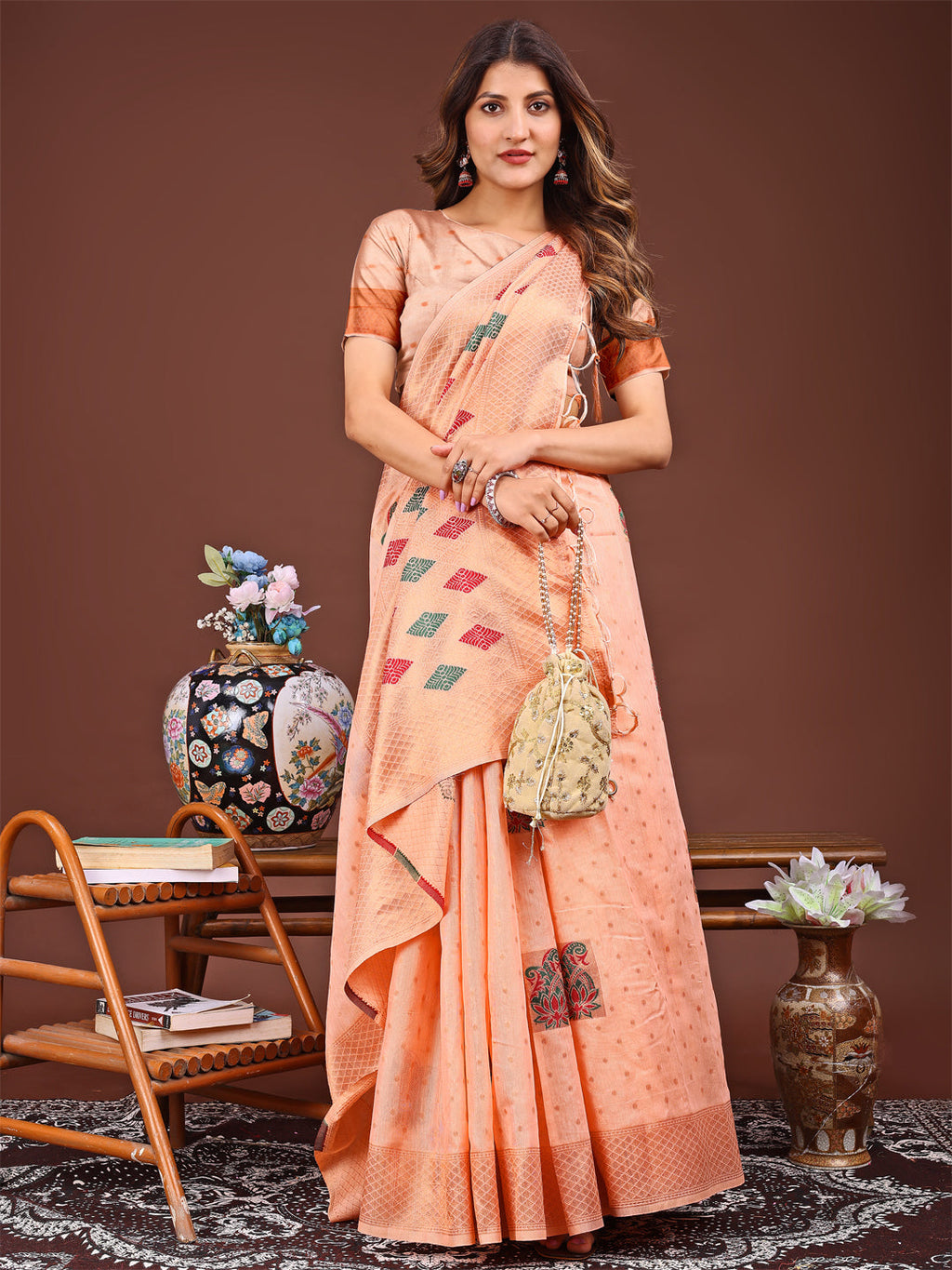 Orange Jacquard Saree with Decorative Tassels and Woven Texture