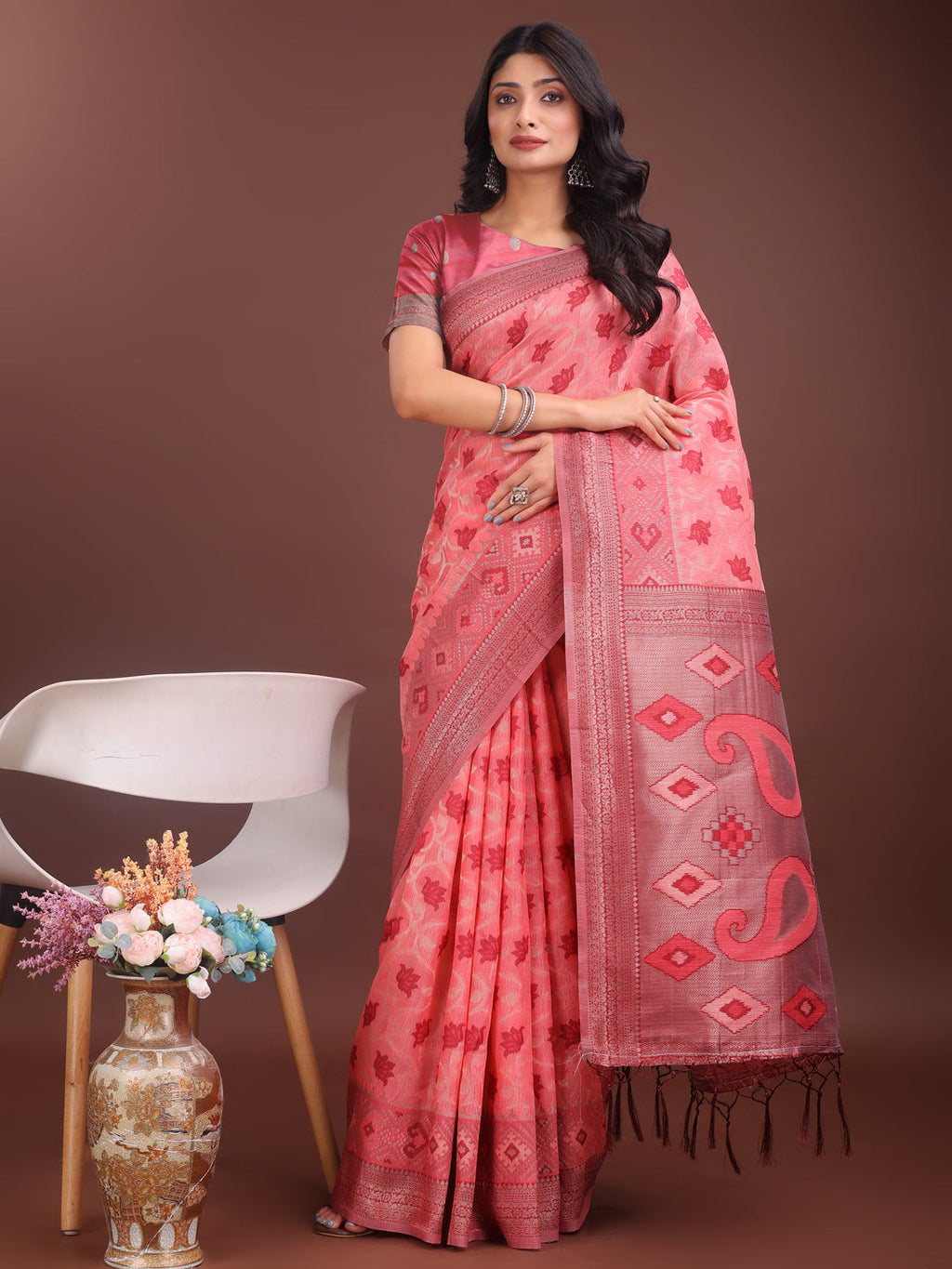 Peach linen cotton saree with intricate woven design and elegant pallu