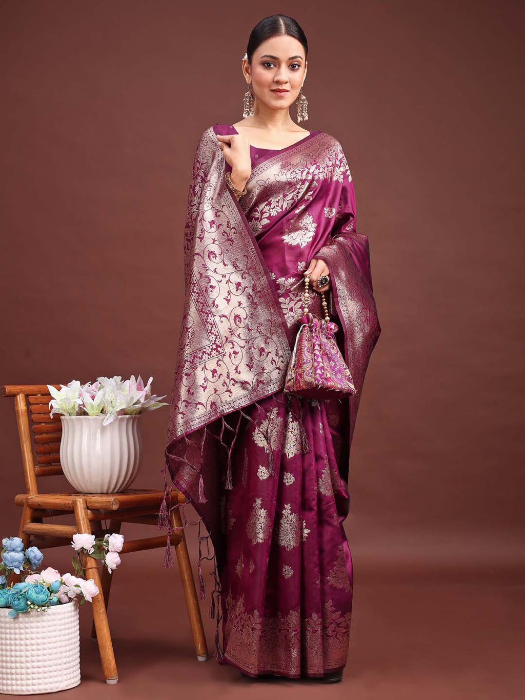 Emerald purple Banarasi silk saree with detailed zari floral work
