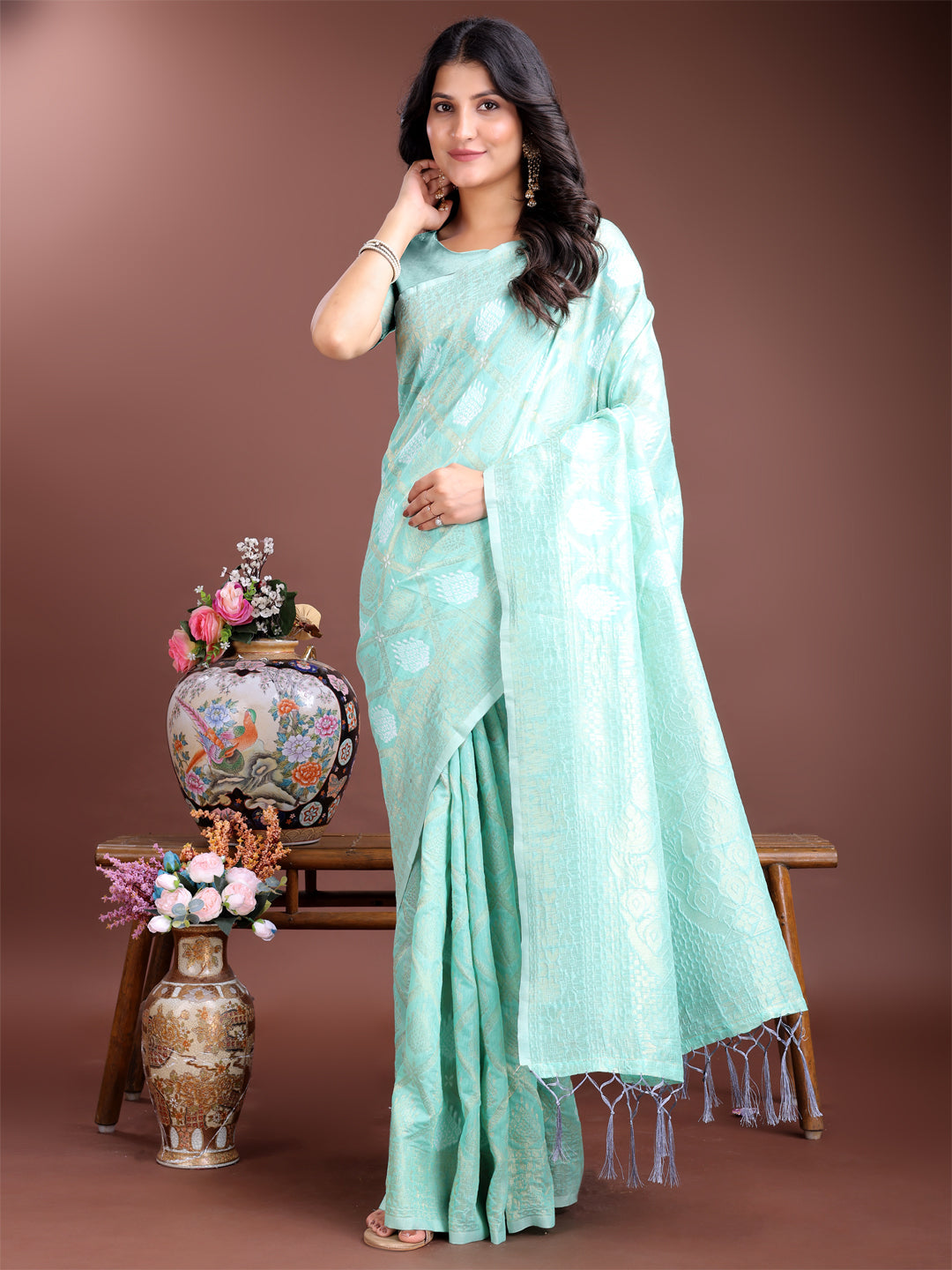 Sea Green cotton saree with woven zari border and traditional tassel pallu