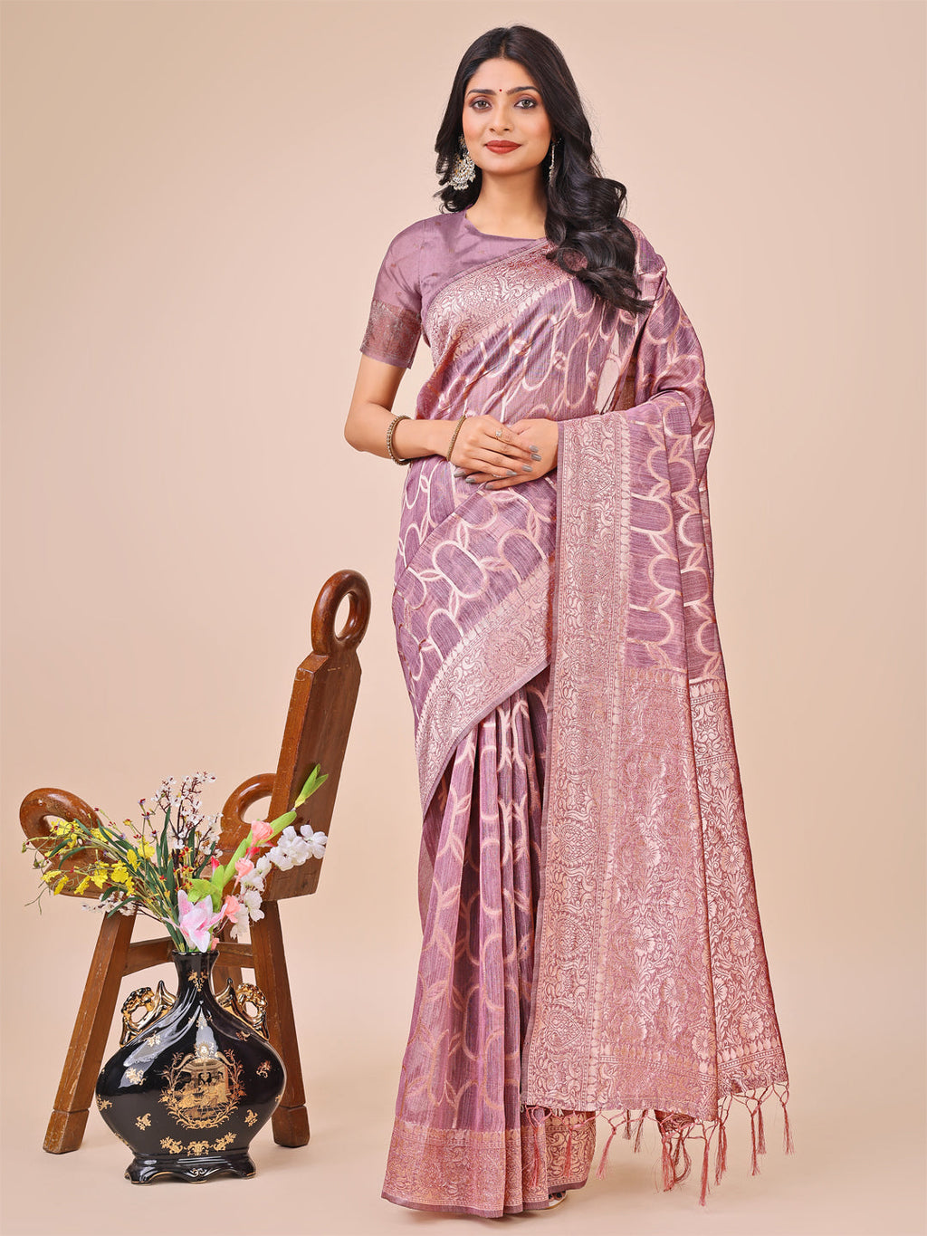 Purple linen cotton saree featuring a silver zari border and geometric pattern
