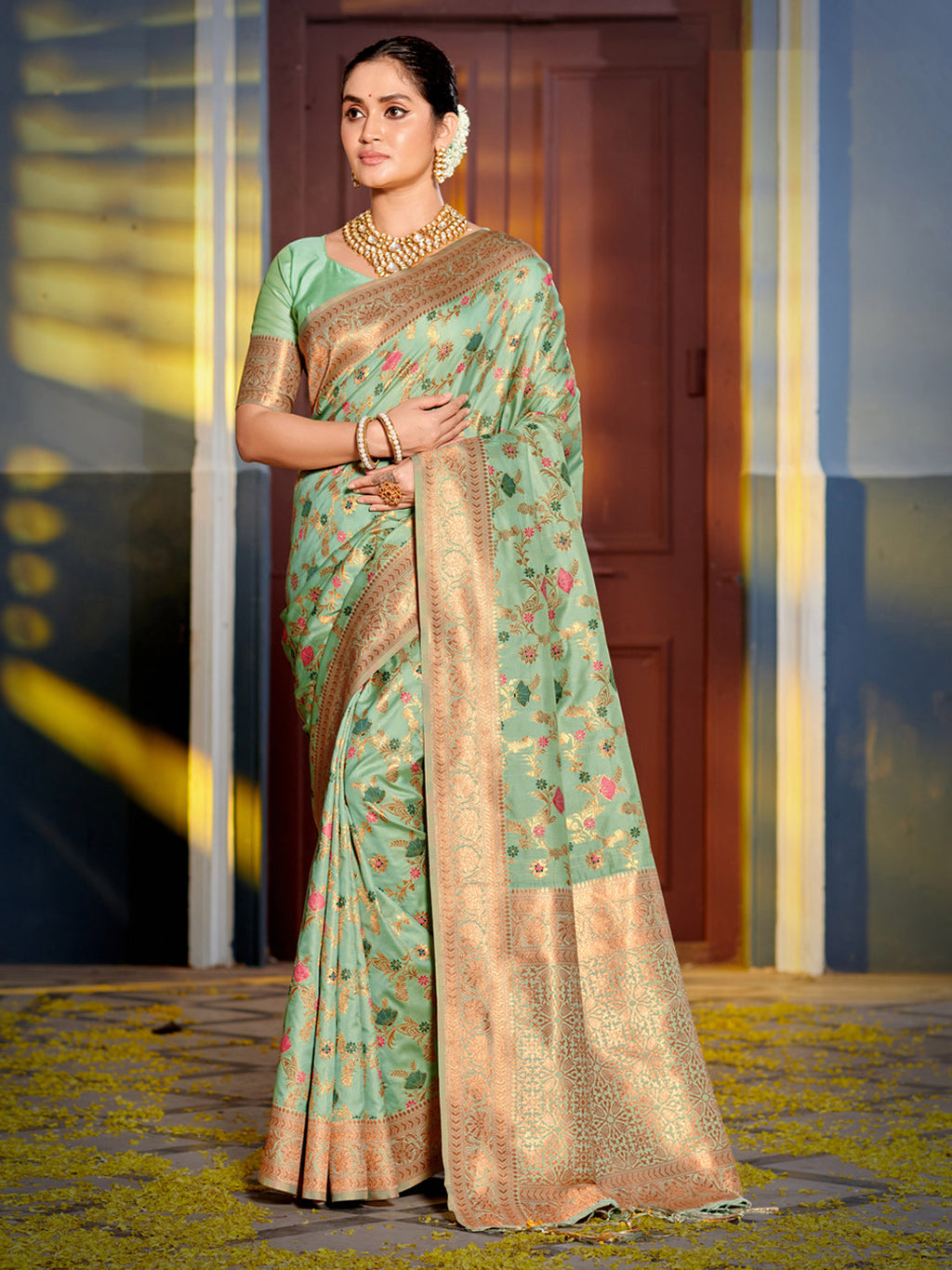 Sea Green Banarasi Silk Saree with golden zari floral jaal border and rich silk fabric.