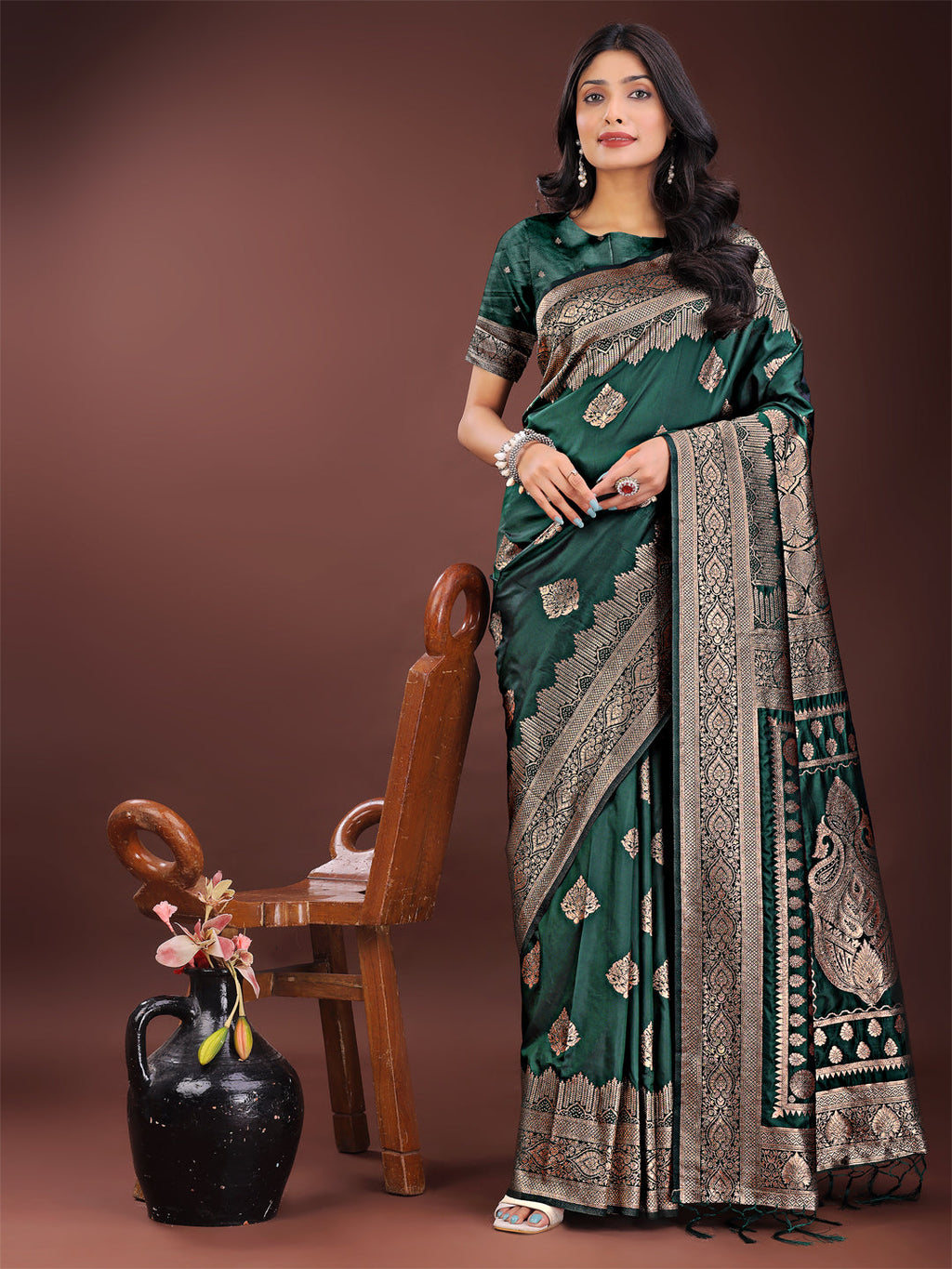 Graceful green Banarasi silk saree with silver zari embroidery