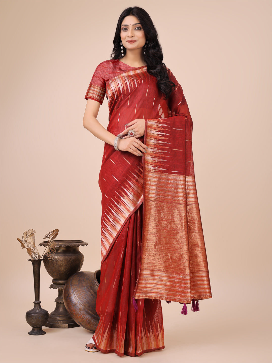 Bold red linen cotton saree with artistic brushwork and copper zari pallu