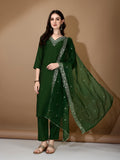 Woman wearing a luxury green hand embroidered Chanderi kurta set with matching pants and dupatta
