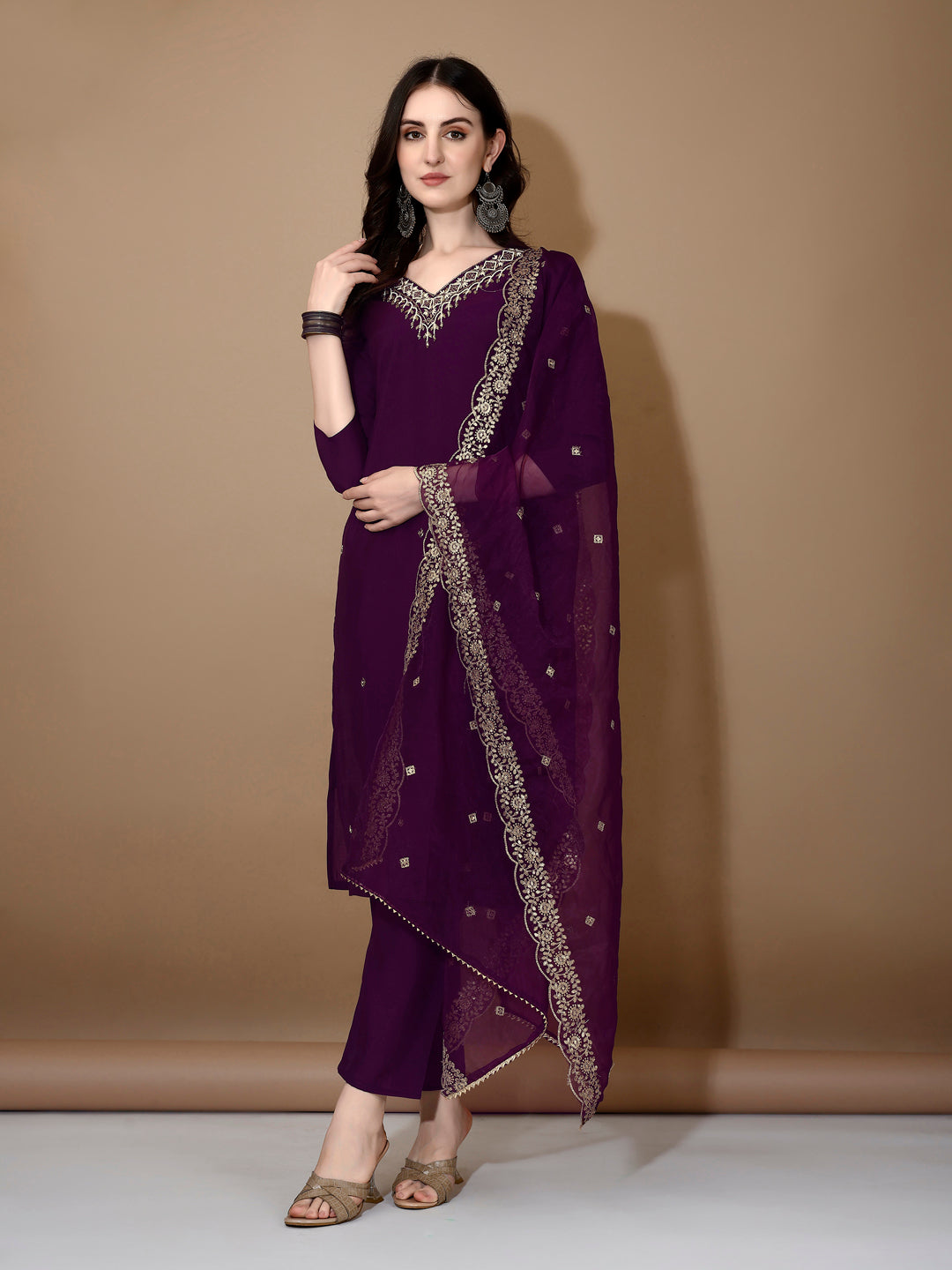Purple Chanderi kurta set with intricate hand embroidery and matching dupatta.