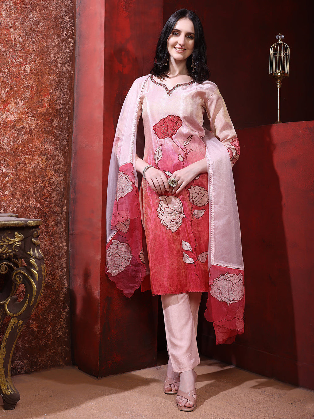 Pink silk kurta set featuring hand-placed floral embroidery with matching pants and dupatta