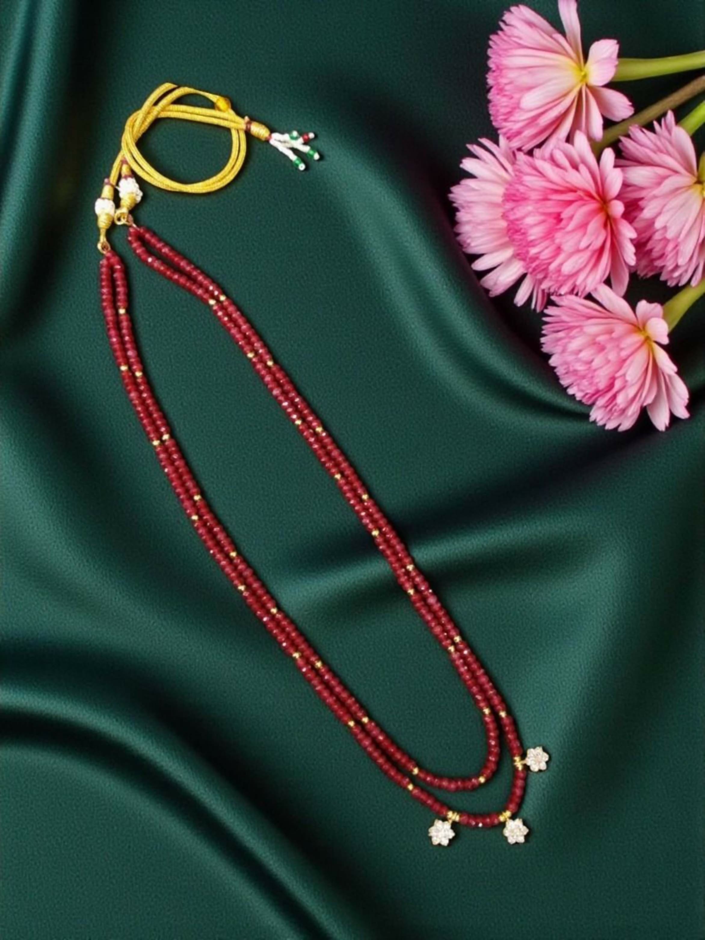 Two-layer red agate bead necklace with American Diamond floral accents