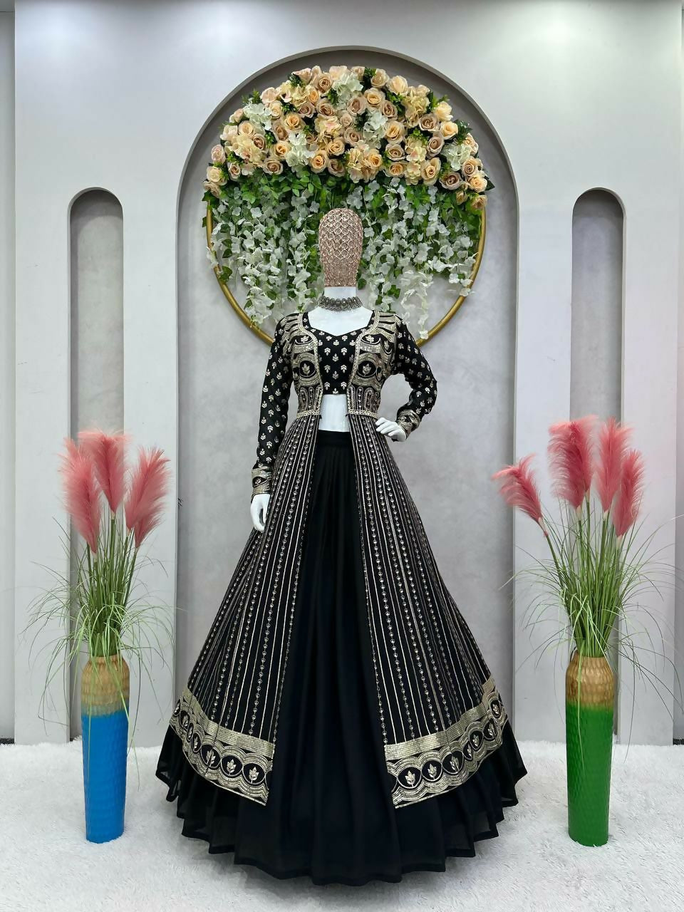 Black faux georgette lehenga choli set featuring sequins and thread embroidery with shrug