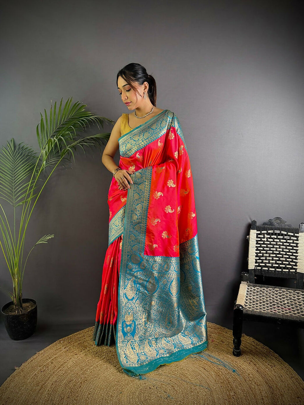 Hot pink Banarasi soft silk saree featuring elegant woven butti patterns