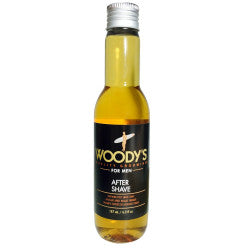 Bottle of Woody's Aftershave Tonic featuring soothing aloe vera and vitamin E
