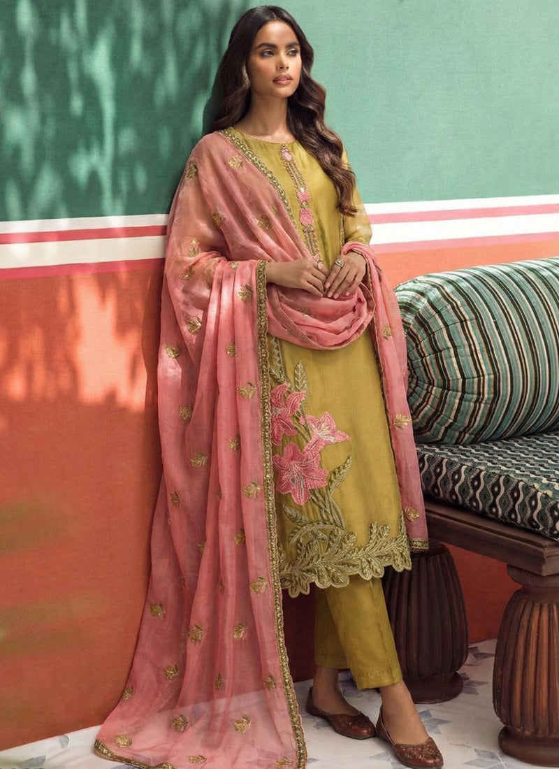 Yellow organza party wear suit featuring traditional zari and Gota Patti embroidery