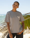 Model wearing a grey Amen unisex crewneck cotton graphic tee in a minimalist streetwear style