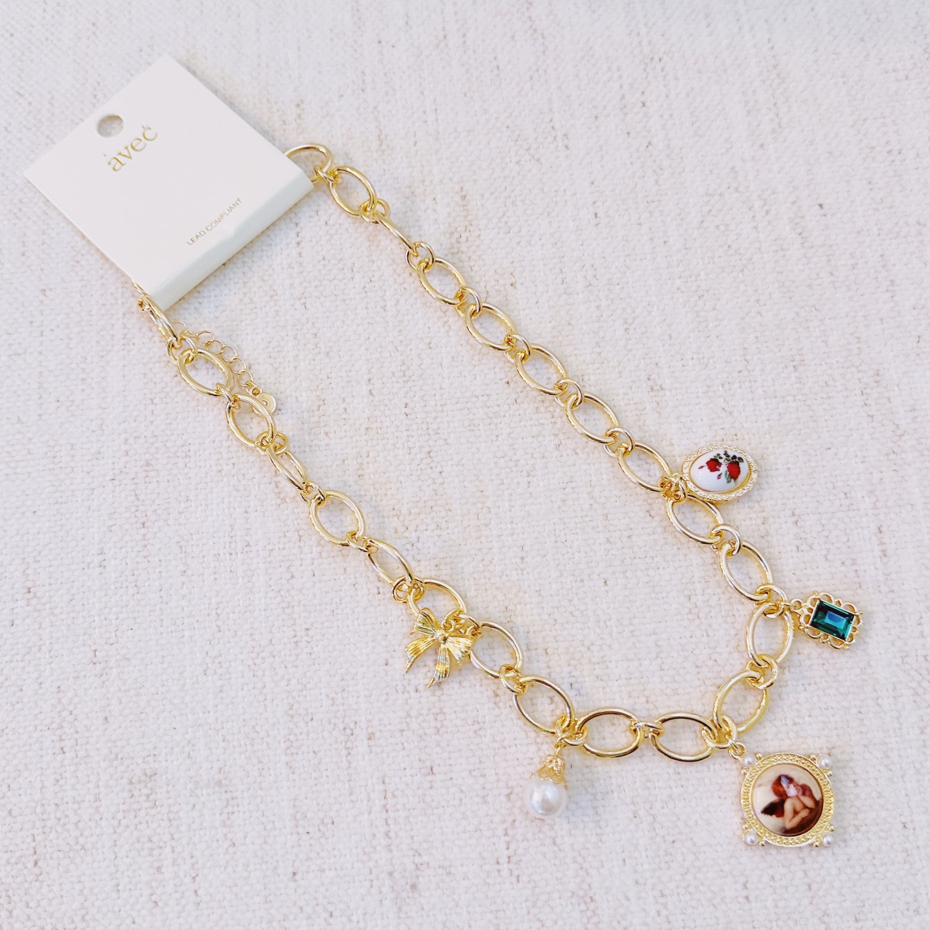 Angel & Rose Charm Necklace – Bold Gold Chain with Whimsical Vintage-Inspired Accents