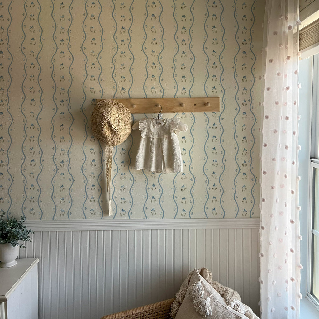 Annabelle floral wallpaper featuring blue, cream, and white coastal-inspired pattern