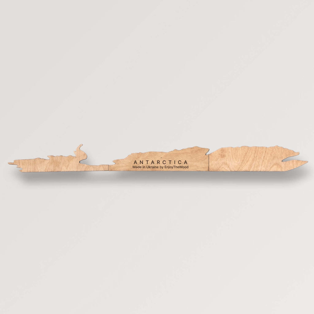 Antarctica wooden map piece in natural colors, shown in multiple size options