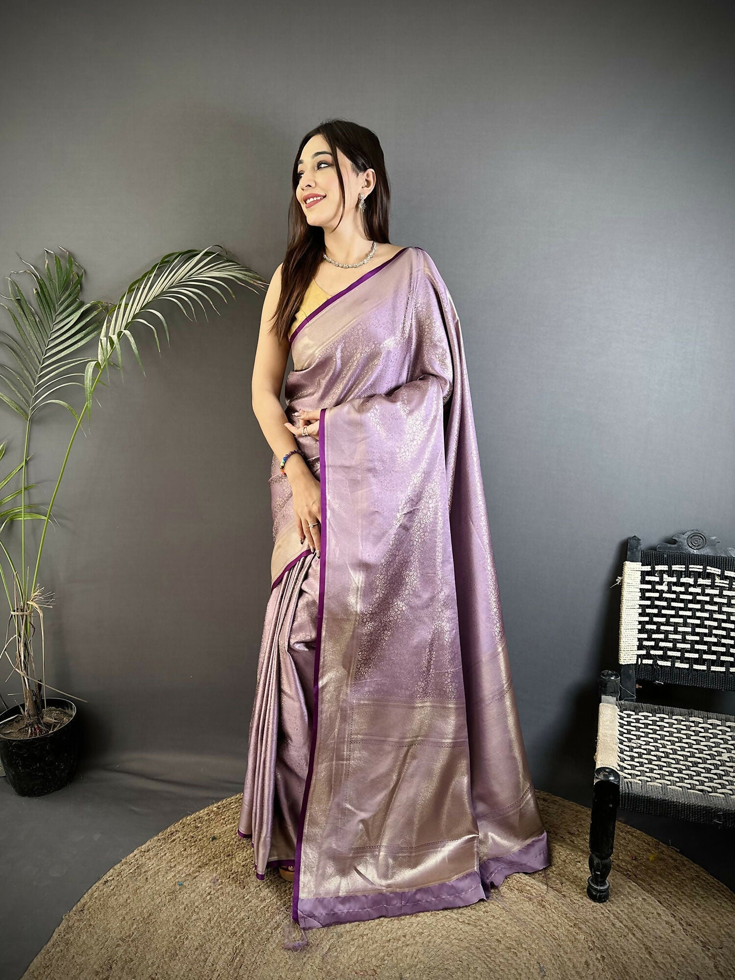 Lavender soft satin silk Kanchipuram saree with floral and ethnic motifs