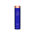 Augustinus Bader The Shampoo in a signature royal blue bottle with bronze accents