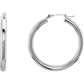 A pair of 25mm solid 14K white gold hoop earrings with a polished rhodium finish
